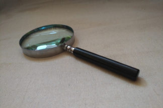 vintage 4 inch magnifying glass with detailed frame