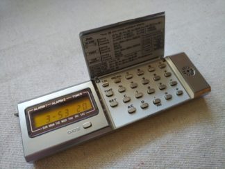 Vintage Casio MQ-2 electronic lcd quartz micro computer calculator and alarm clock made in Japan