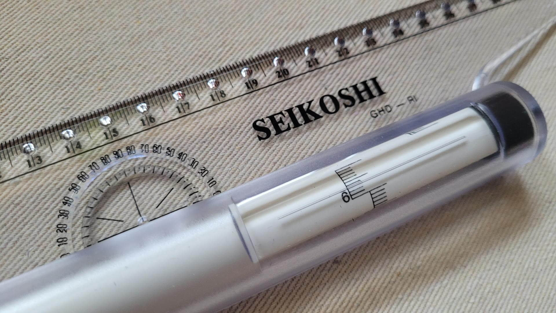 Vintage Sekoshi parallel rolling ruler with metric balancing scale 30 cm long. Made in Japan art, architectural, drawing, and lettering collectible tool used for drawing vertical and parallel lines, charts and graphs, 3D drawings, angles, horizontal lines, circles, musical notes and more.