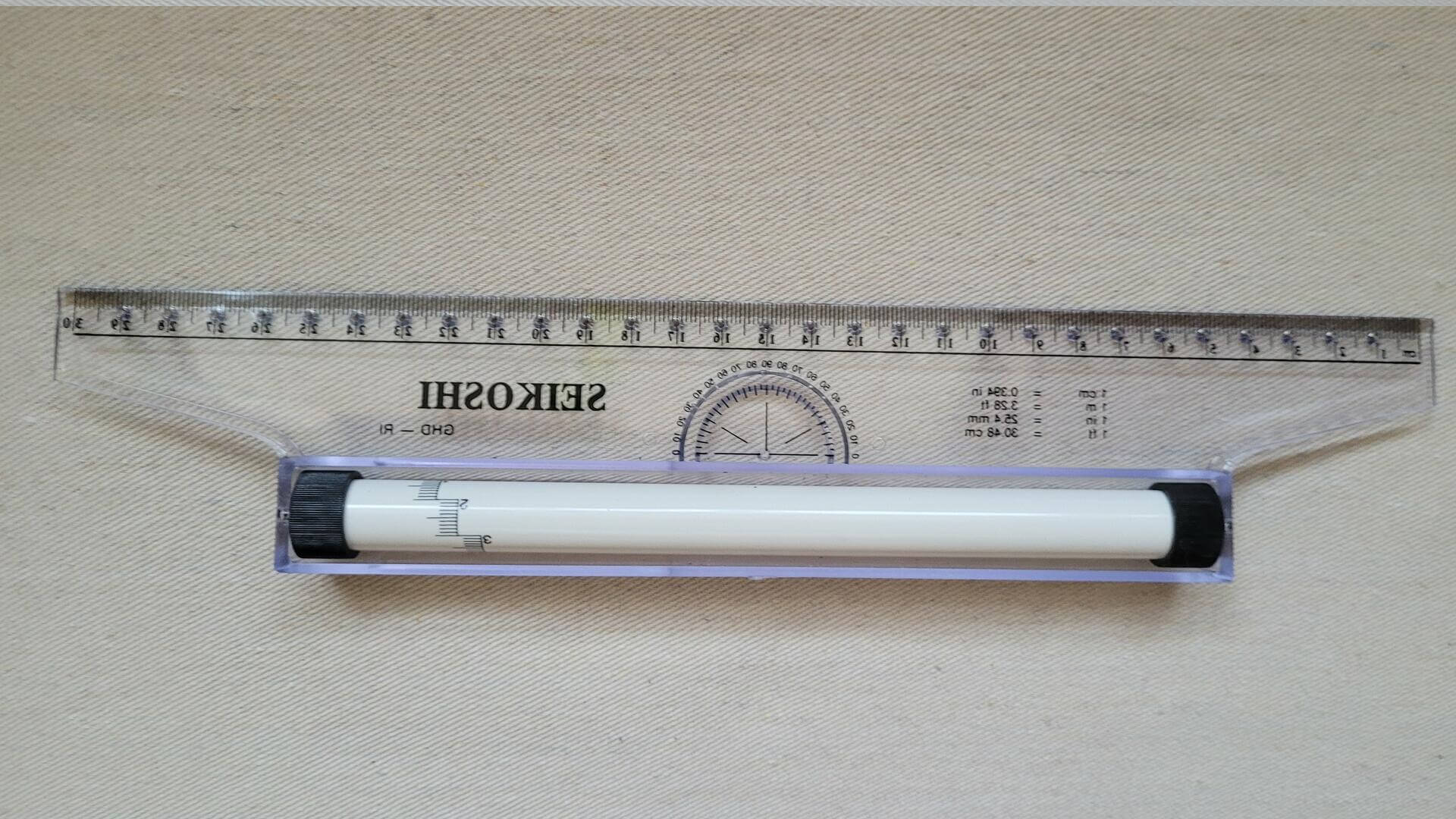 Vintage Sekoshi parallel rolling ruler with metric balancing scale 30 cm long. Made in Japan art, architectural, drawing, and lettering collectible tool used for drawing vertical and parallel lines, charts and graphs, 3D drawings, angles, horizontal lines, circles, musical notes and more.