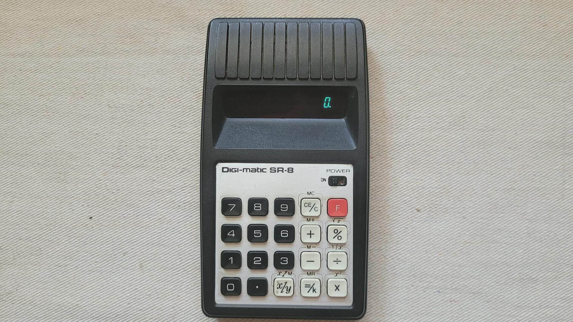 1970s Sears Digi-matic SR-8 Arithmetic Calculator with 8 Digits 9 functions, 20 keys, and a VFD (vacuum fluorescent) display - Made in Japan vintage collectible electronics and gadgets