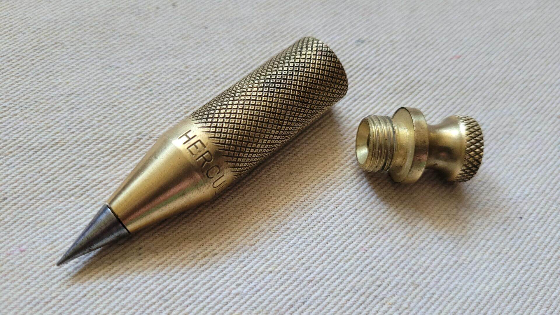 Vintage Solid Brass Hercules 8 Knurled Plumb Bob w Steel Point Tip - Vintage woodworking and stone mason marking and measuring collectible tools