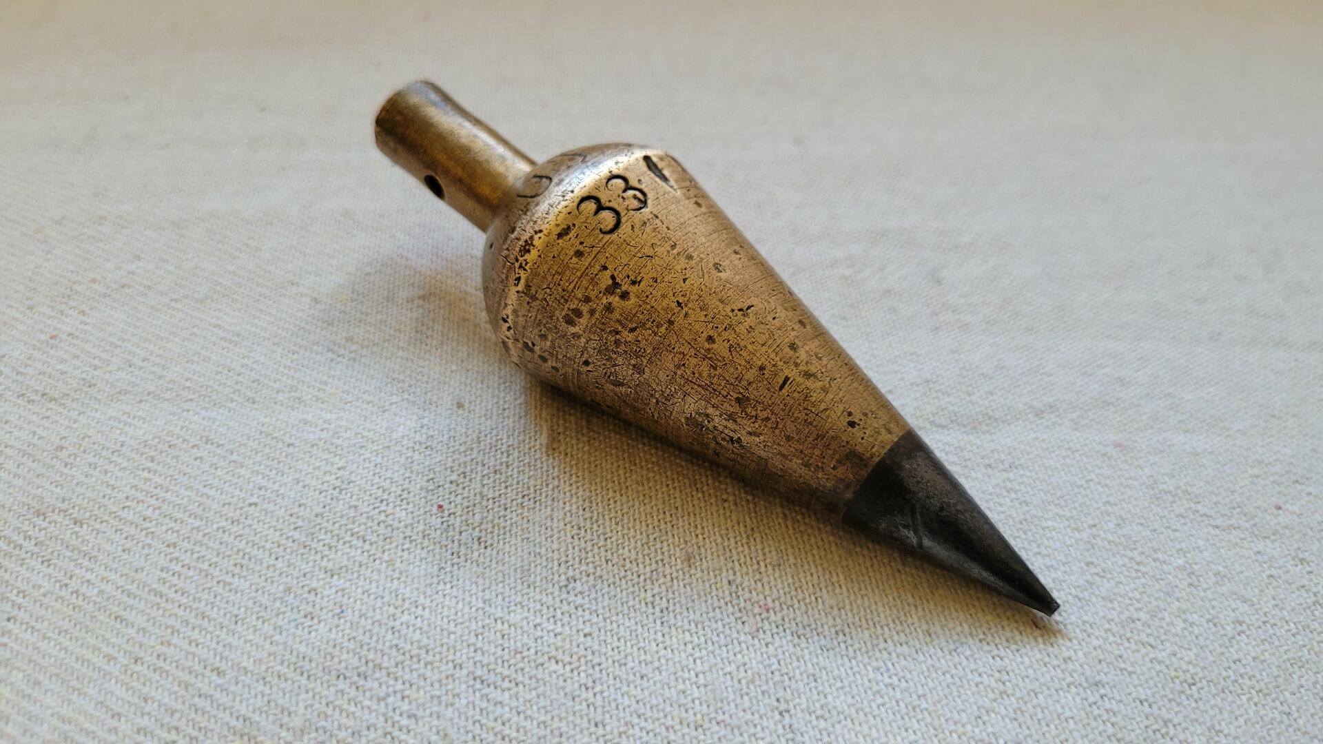 Vintage Solid Brass Carrot Plumb Bob with Steel Tip Level - Antique carpenter and stone mason marking and measuring collectible tools