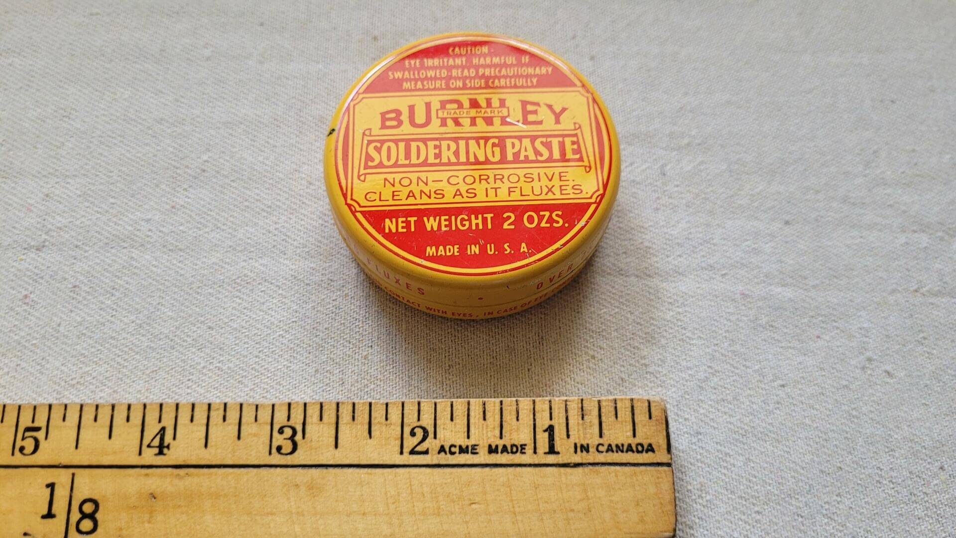 Brunley Battery & Mfg Co, North East Pennsylvania antique soldering paste 2 ounce yellow tin can with bold red lettering. Nice made in USA vintage collectible advertising container and beautiful early 20th century product and marketing design piece
