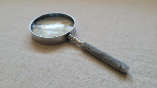 Vintage magnifying glass with knurled stainless steel handle 5 inches long with 2" lens. Antique collectible desktop office magnifier and visual aid tool