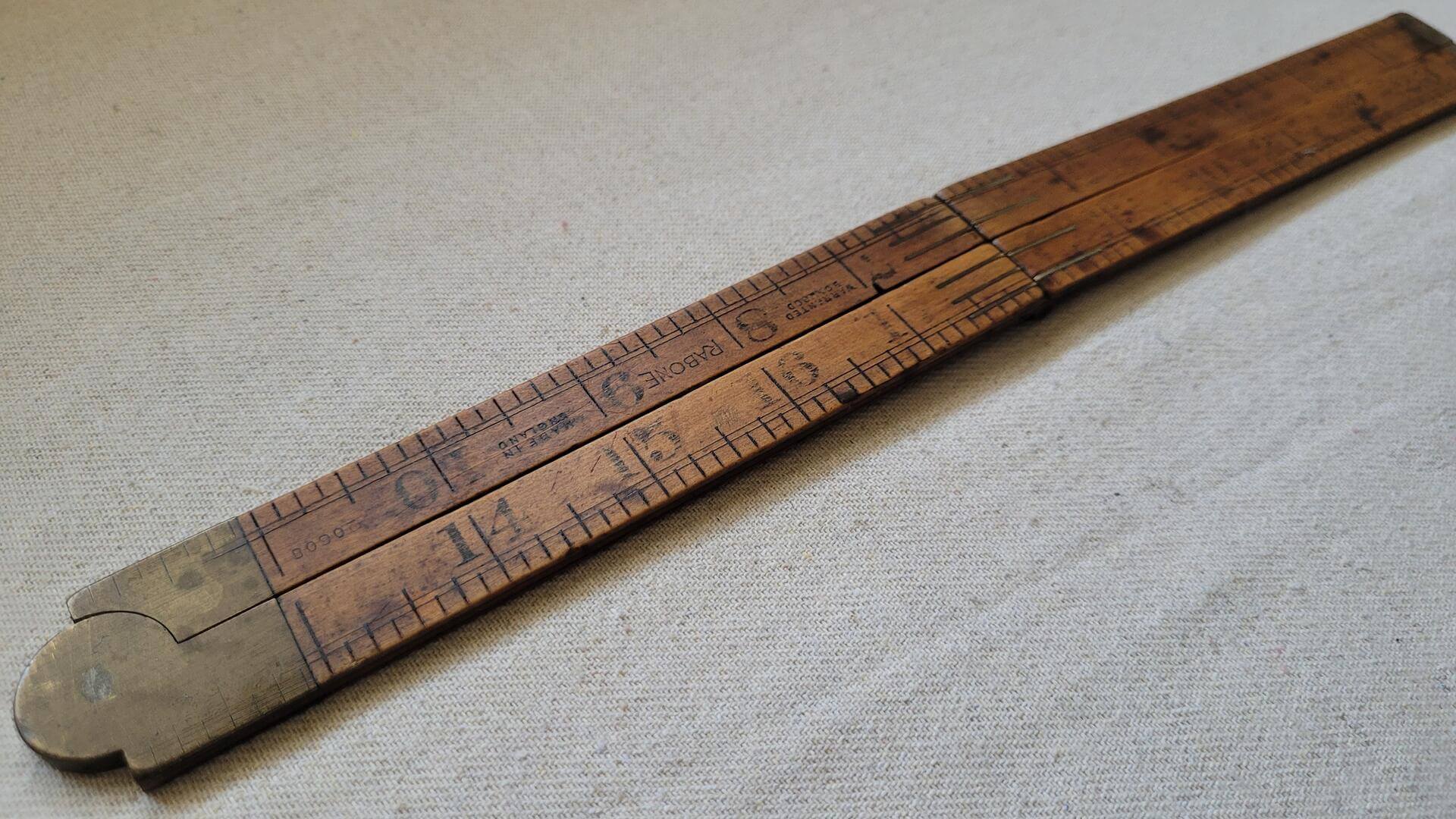 Vintage Rabone No. 6080 warranted boxwood and brass folding ruler two feet long. Rare antique made in England collectible yardstick and measuring tool