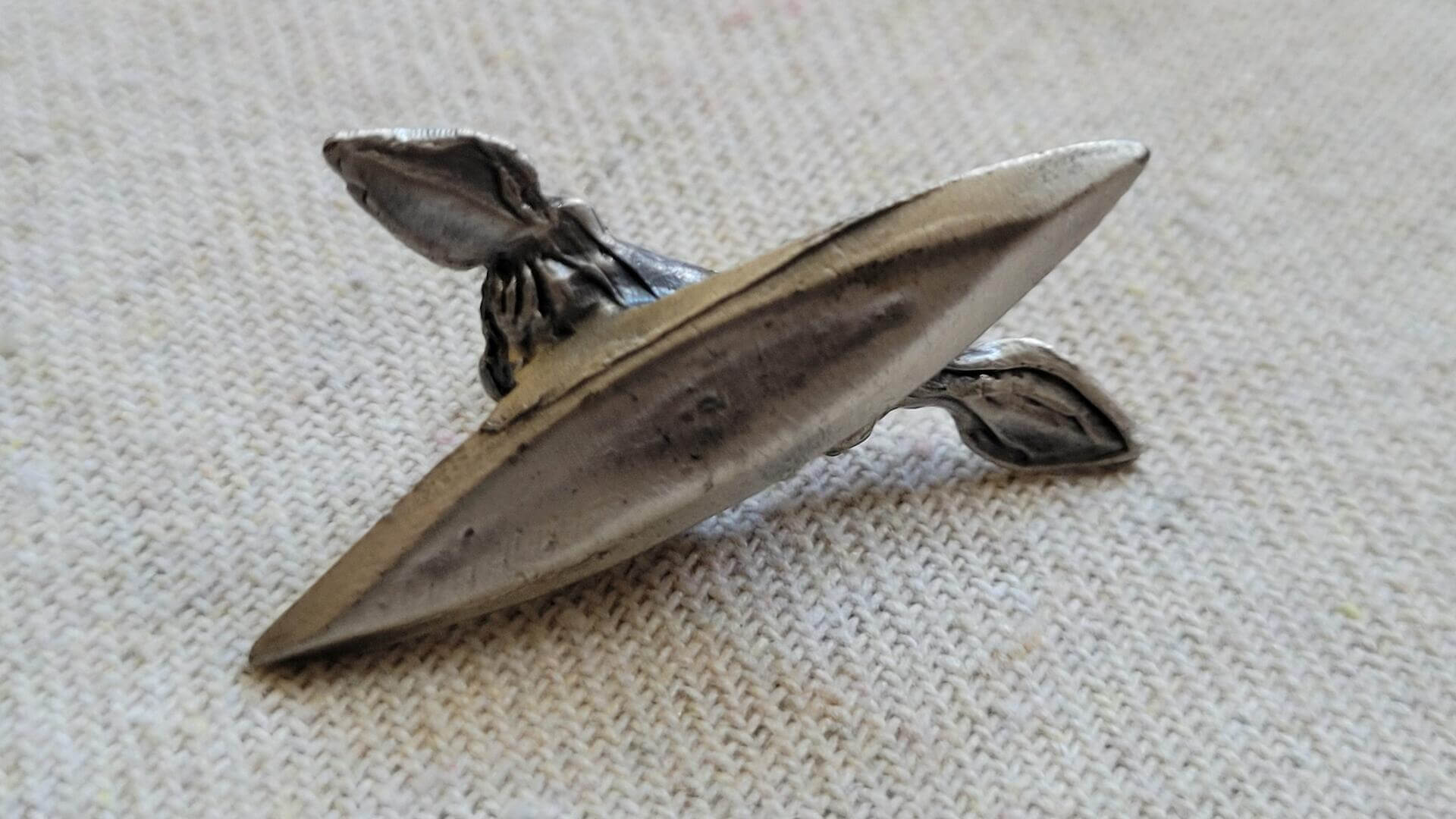 Vintage Inuit Hunter in Kayak miniature pewter sculpture 1.5 inches small - Rare Inuit native folk art and Canadiana collectible art piece