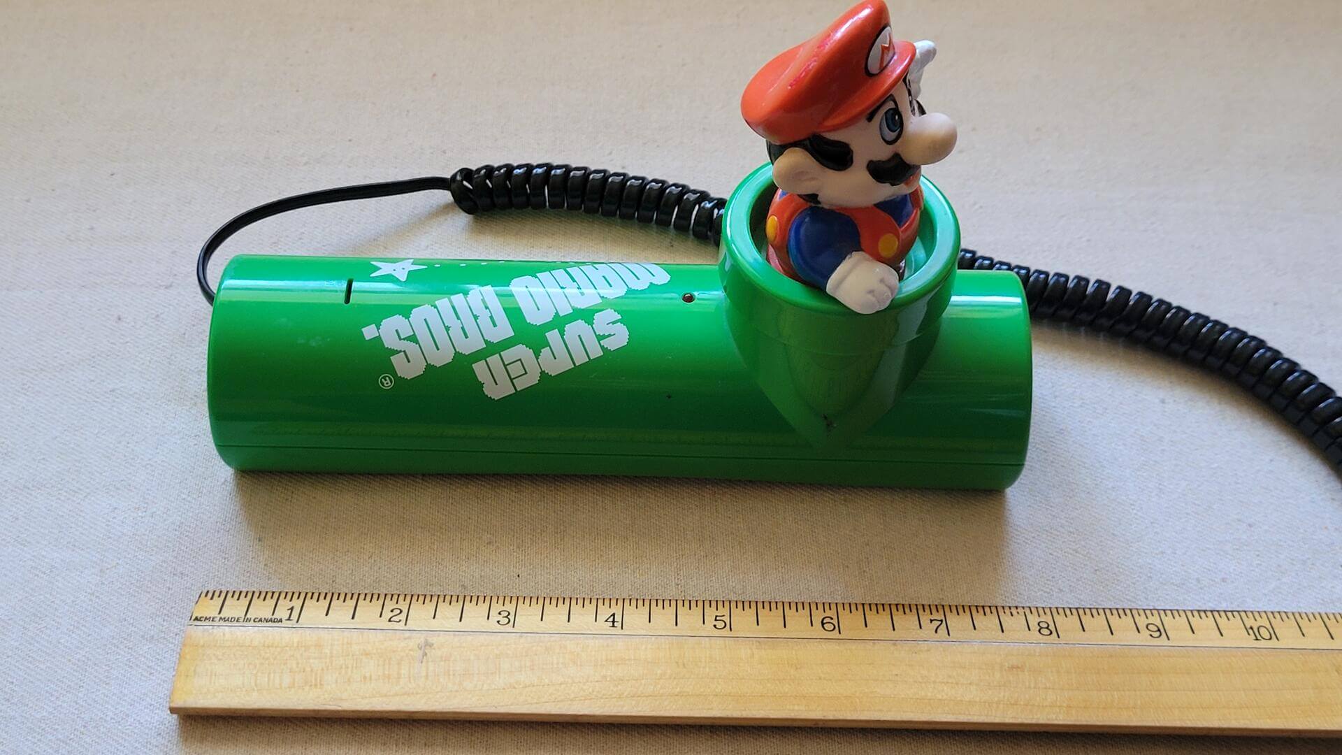 Rare vintage green Super Mario Brothers Nintendo touch tone telephone model MBS-38. Retro 1990s made in Hong Kong collectible Nintendo phone and electronic gadget