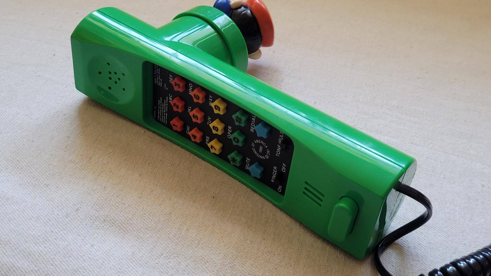 Rare vintage green Super Mario Brothers Nintendo touch tone telephone model MBS-38. Retro 1990s made in Hong Kong collectible Nintendo phone and electronic gadget