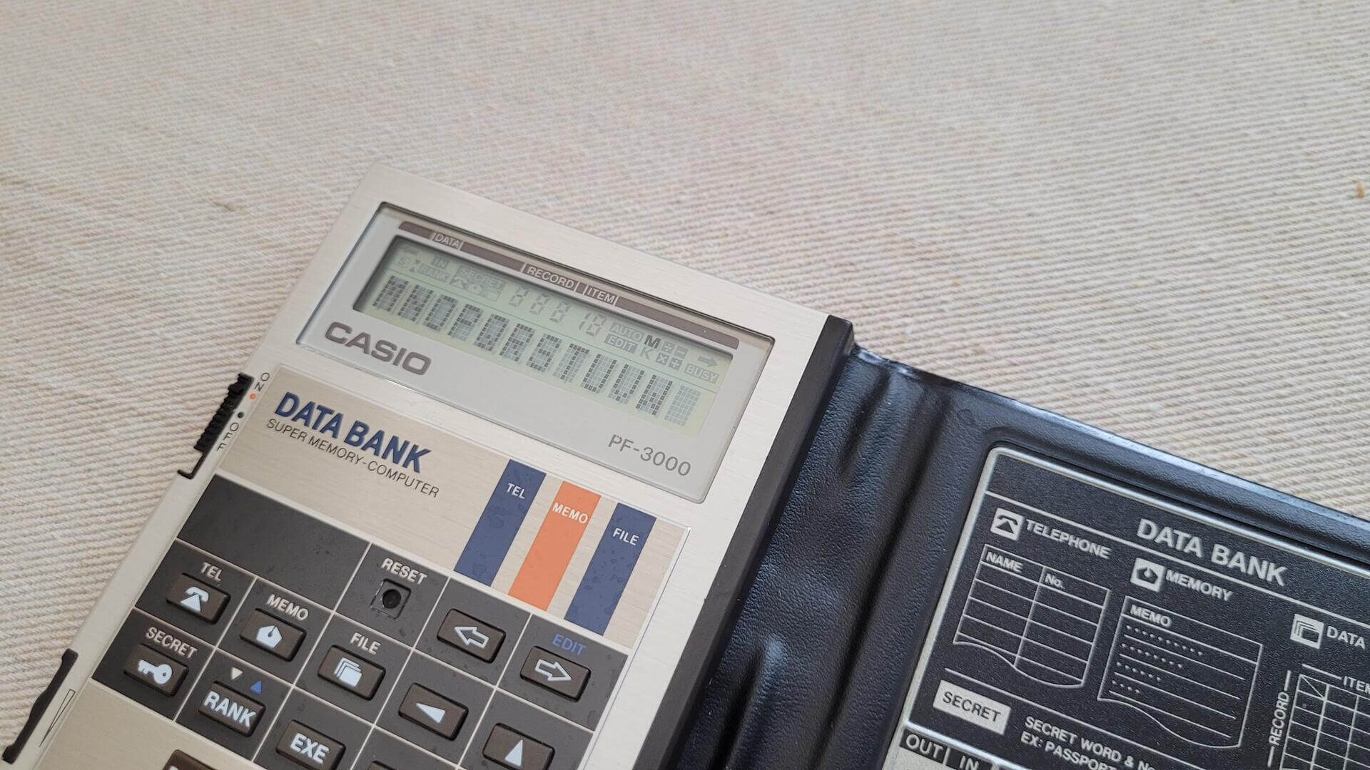Vintage 1980s Casio Databank PF-3000 Super Memory-Computer Calculator. Rare made in Japan collectible electronic gadget and data bank computer with dot matrix liquid crystal display.