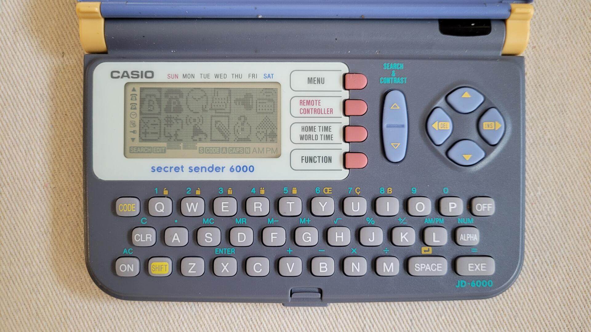 Rare 1990s vintage Casio Secret Sender 6000 Electronic Communicator Organizer Calculator