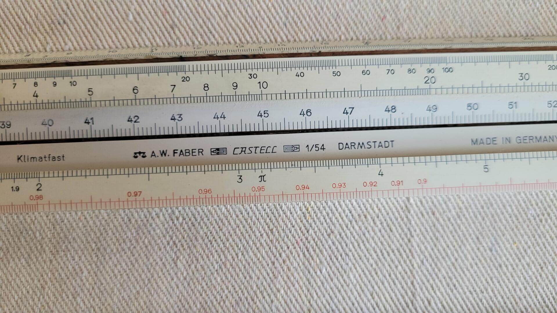 Vintage A.W. Faber Castell model 1/54 Darmstadt 25cm slide rule with the original box. Mid century MCM design made in Germany collectible engineering marking and measuring tool