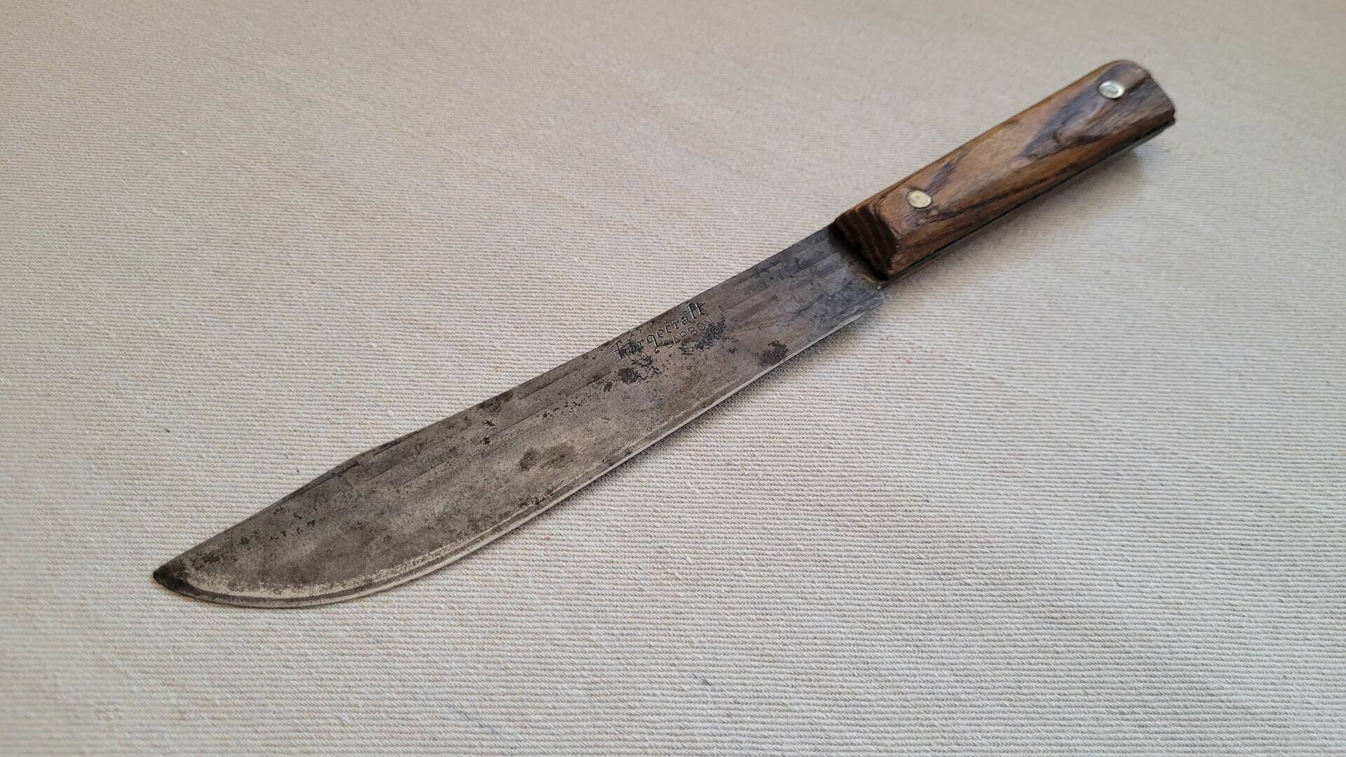 Beautiful vintage Forgecraft Hi-Carbon steel kitchen knife with hickory wood handle and brass rivets. Mid century made in USA collectible chef and butcher knives and cutlery