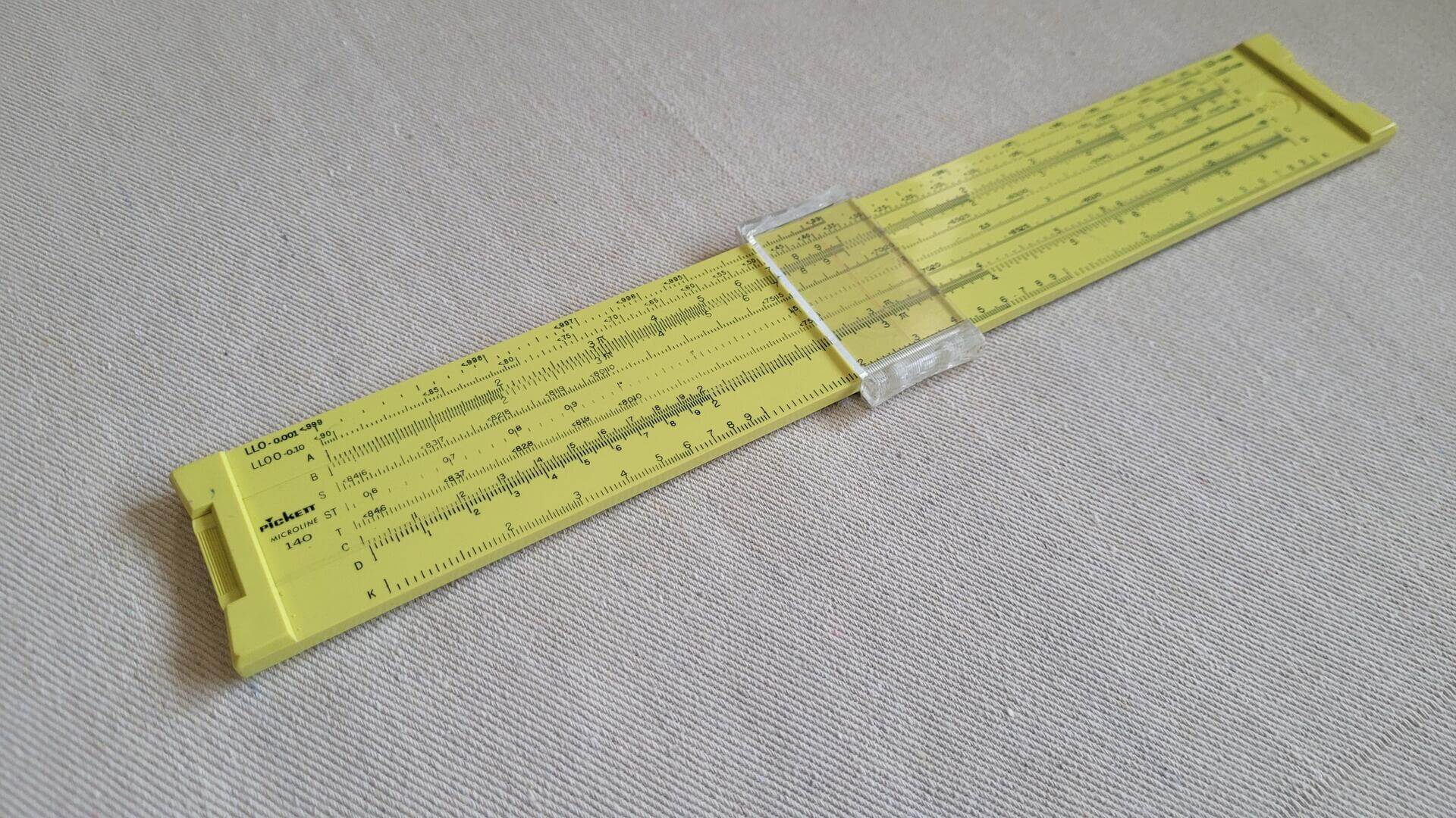 Vintage Picket Industries Microline model 140 duplex slide rule with clear indicator manufactured in Santa Barbara, CA. Mid century MCM made in USA collectible school and engineering marking and measuring tool
