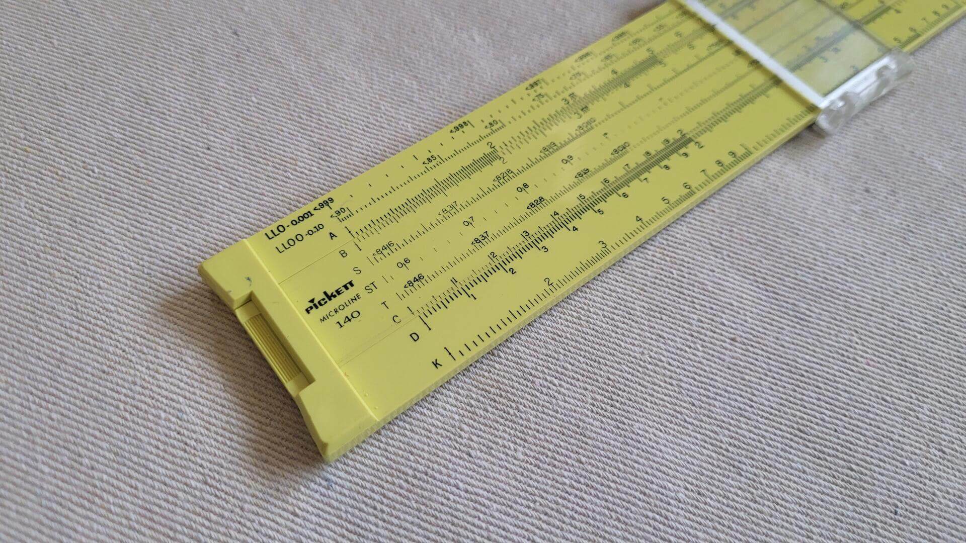 Vintage Picket Industries Microline model 140 duplex slide rule with clear indicator manufactured in Santa Barbara, CA. Mid century MCM made in USA collectible school and engineering marking and measuring tool