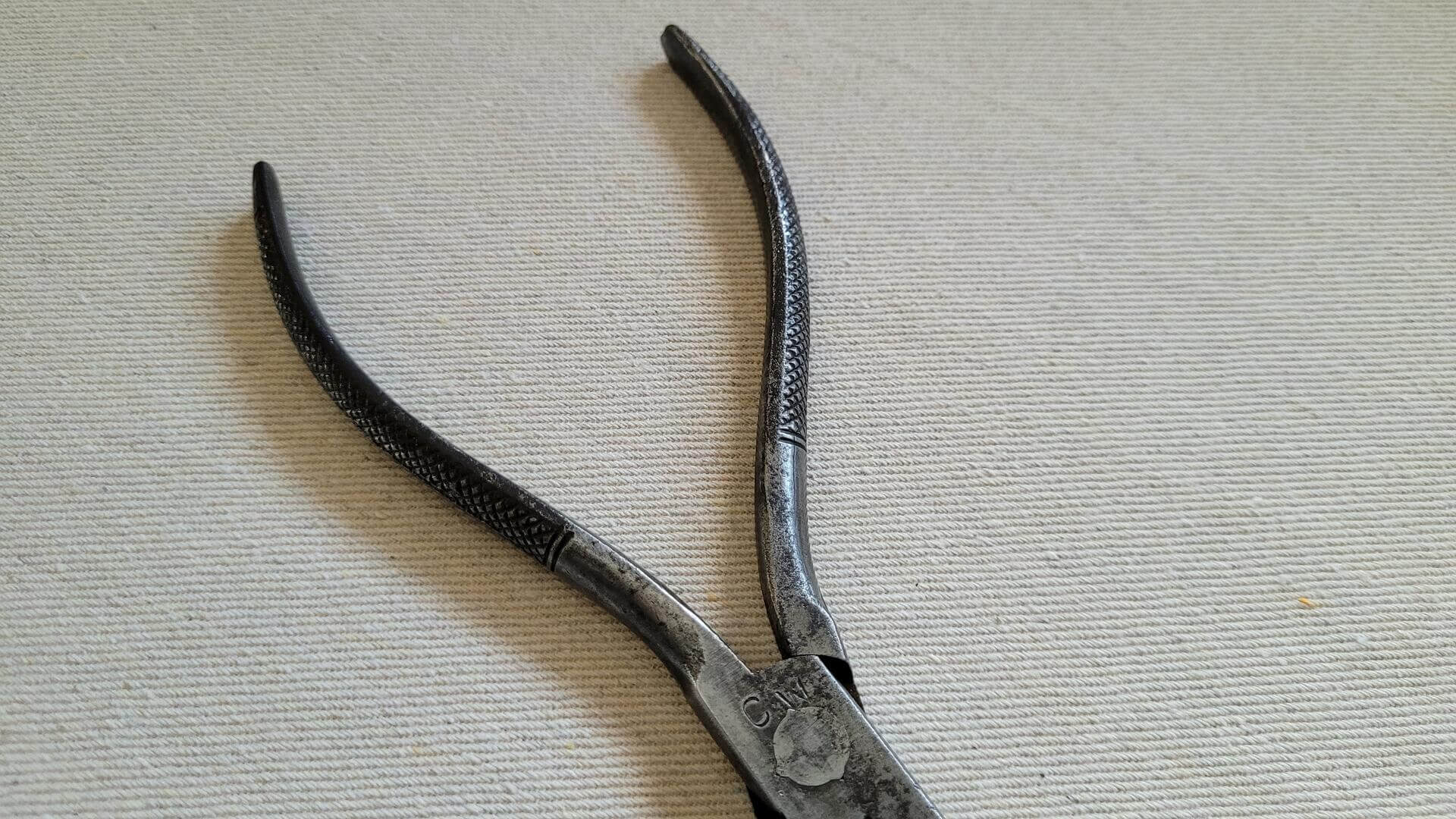 Vintage straight snap ring needle nose pliers with knurled handles and CW stamp. Antique and rare collectible mechanic hand tools 8 inches long