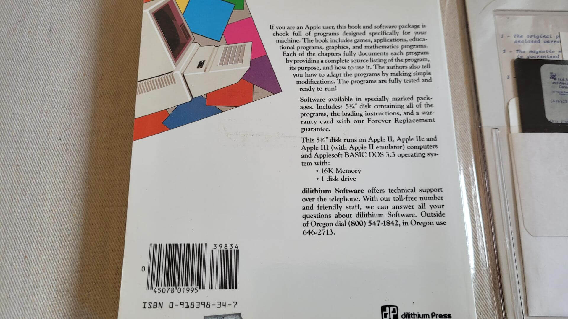 32 Basic programs for the Apple Computer, 1982 book by Tom Rugg and Phil Feldman and published by Dilithium Press. Rare vintage computer book with the sealed 5 1/4" disk that runs on Apple II, Apple IIe and Apple III computers and Applesoft Basic DOS 3.3 operating system