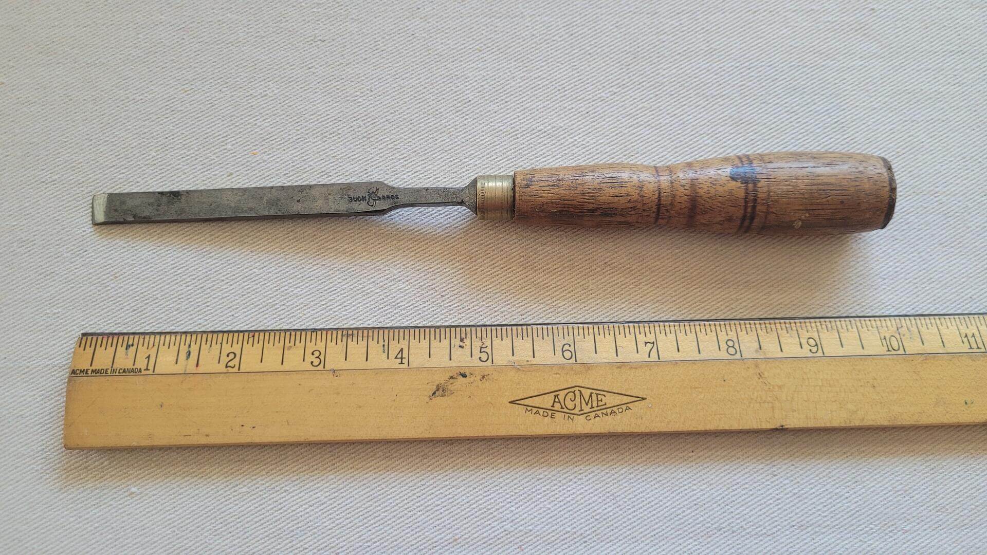 Antique Buck Bros 3/8" firmer tang cast steel chisel with brass ferrule and wooden handle. Vintage made in USA collectible woodworking and carpentry hand tools