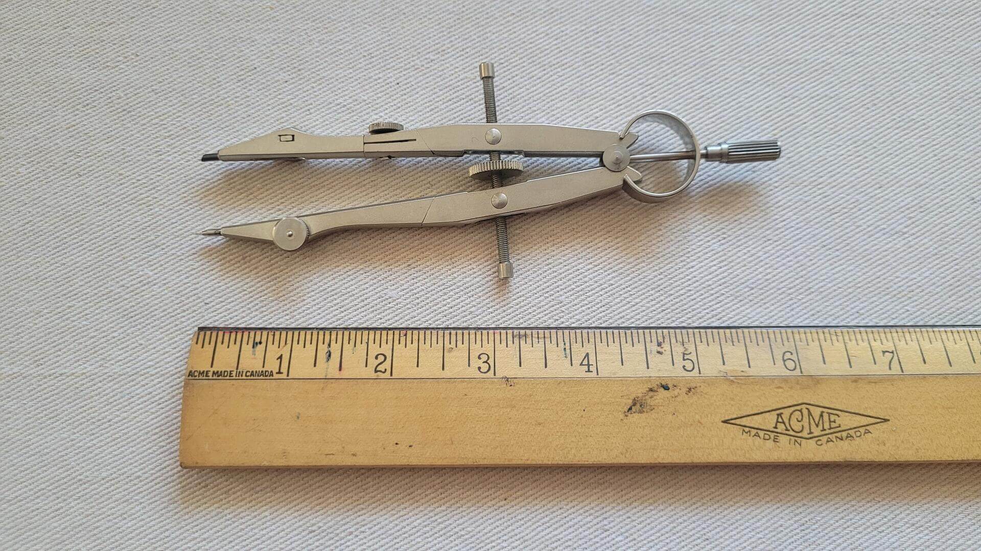 Charvoz No 11-3331 adjustable spring compass with the case and two extra pieces. Vintage made in Germany quality collectible drawing instrument and drafting tool
