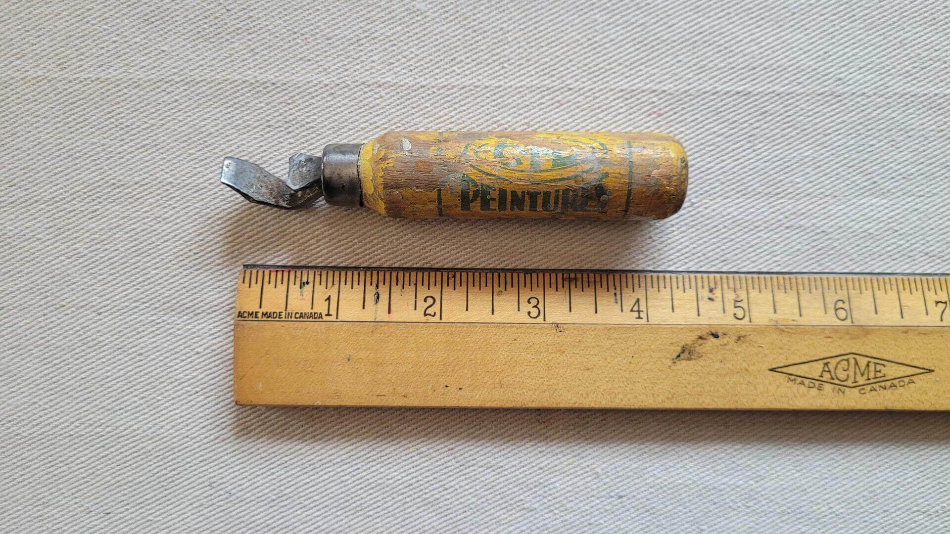 Rare antique CIL Peintures paint can opener personalized for Lacroix Ferronnerie hardware store from Lachine, a borough within the city of Montreal. Vintage made in Canada collectible artist and painter tools