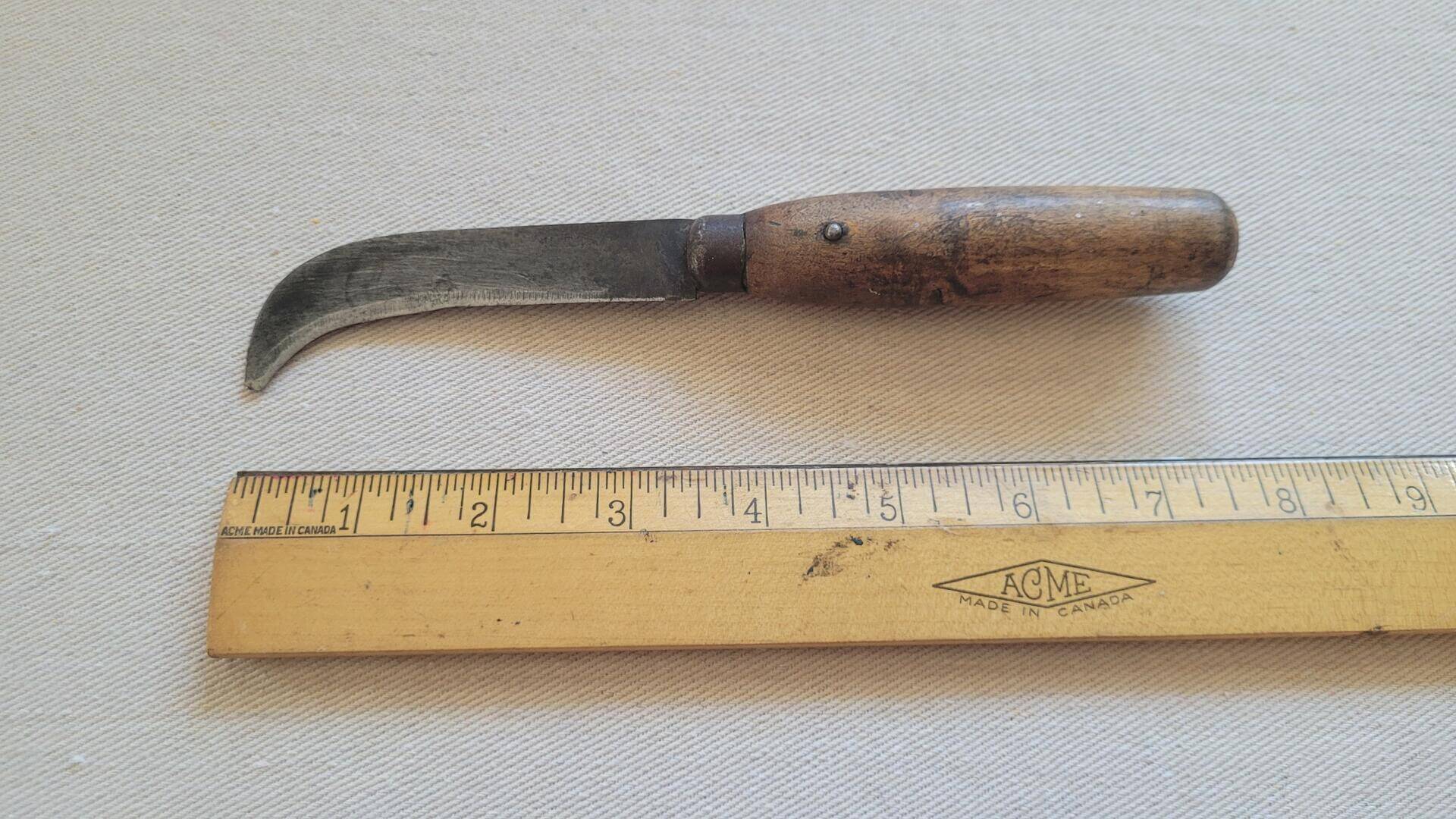 Antique H Thompson curved sharp point cobbler leather working and cutting knife. Vintege collectible made in Sheffield England collectible knives and shoe maker tools.