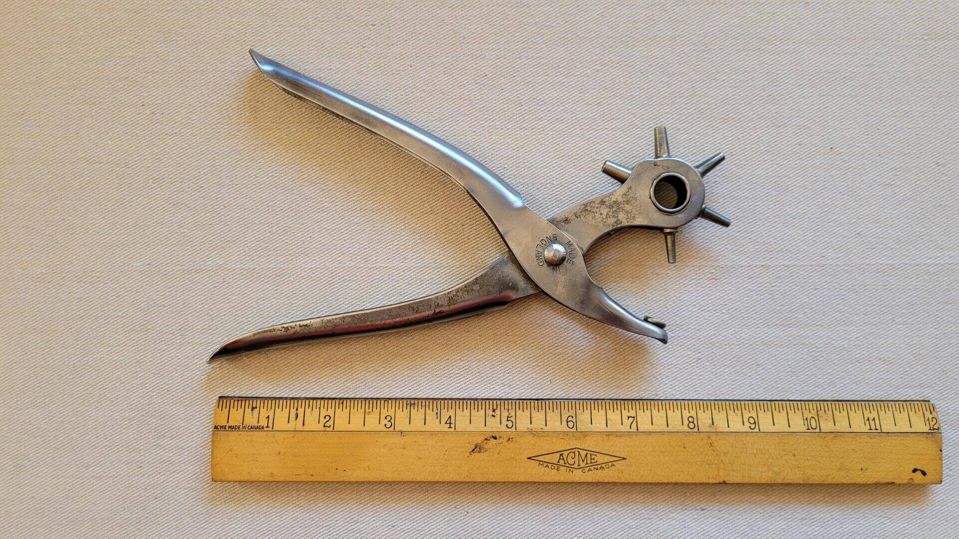 Vintage Mibro revolving leather hole punch pliers. Antique made in England collectible cobbler and leathermaking hand tool with 6 different punch size diameters