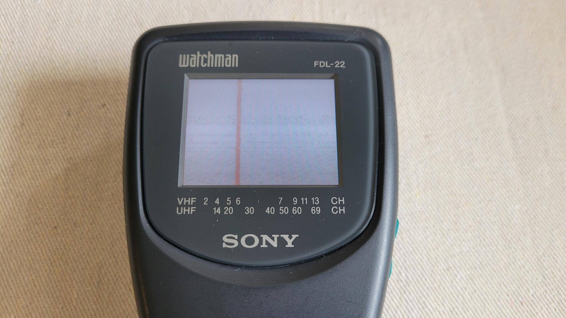 Sony Watchman FDL-22 LCD Analog mini hand held colour portable television with the strap. Vintage made in Japan collectible electronic gadgets