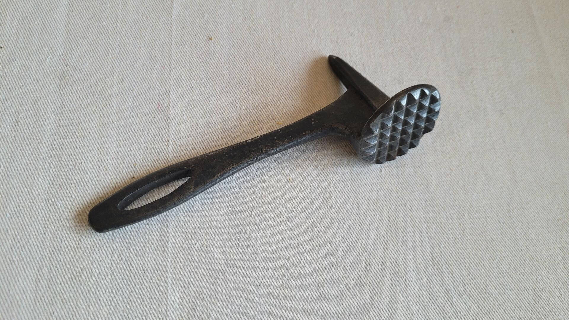 Vintage farmhouse cast iron meat tenderizer cooking hammer tool with serrated teeth and pick 8 inches long