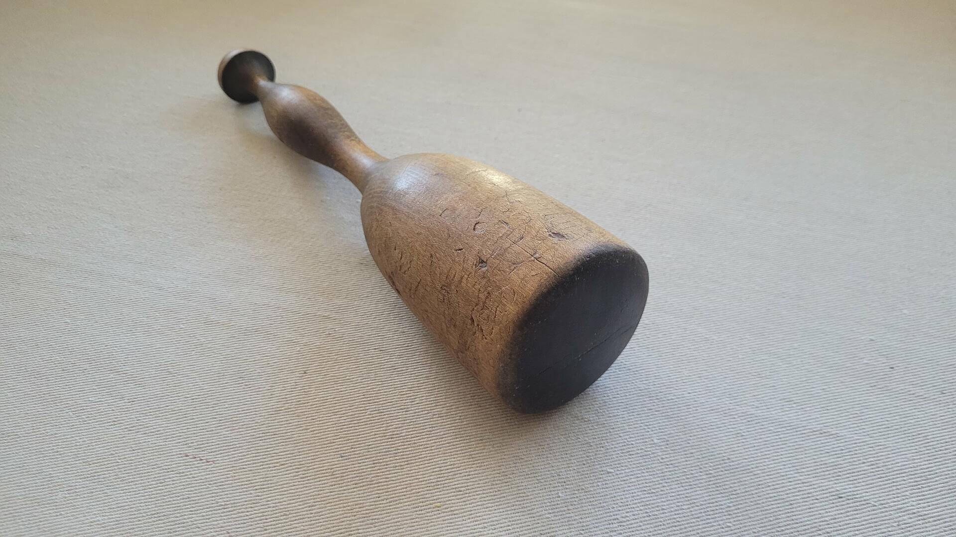 Antique large turned wood pestle, food grinder and crusher. Vintage collectible primitive kitchen wooden mallet and crushing tool