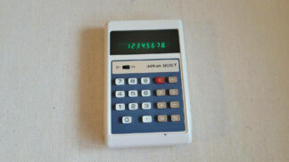 Rare 1975 UniMark 805T vintage arithmetic calculator 8 digits precision and algebraic logic, and VFD (vacuum fluorescent) display