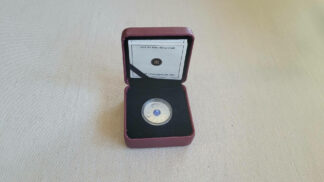 2011 Royal Canadian Mint $3 Birthstone Collection fine silver coin with Zircon, December wisdom and wealth birthstone.