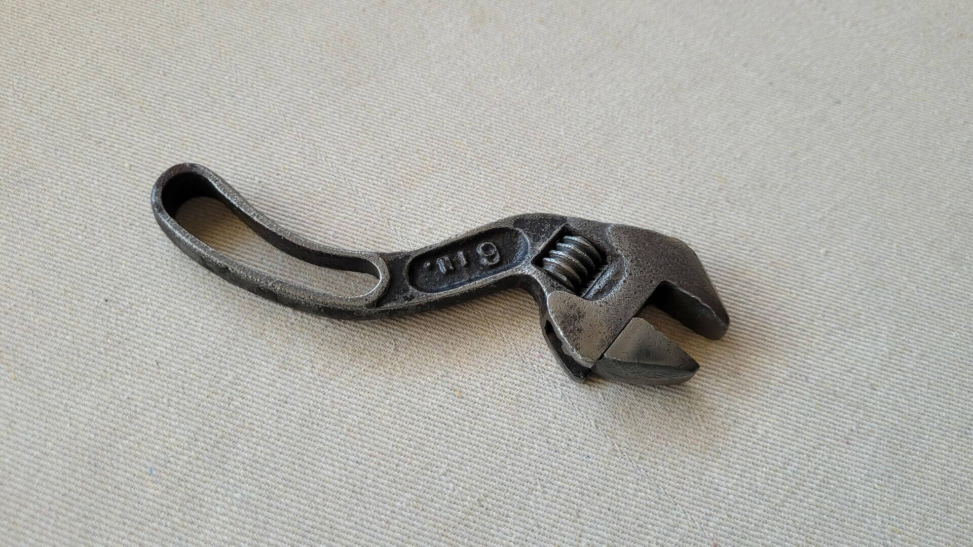 Vintage Bemis & Call Company adjustable S curved wrench 6 inches long. Vintage made in USA collectible automotive and machinist hand tools
