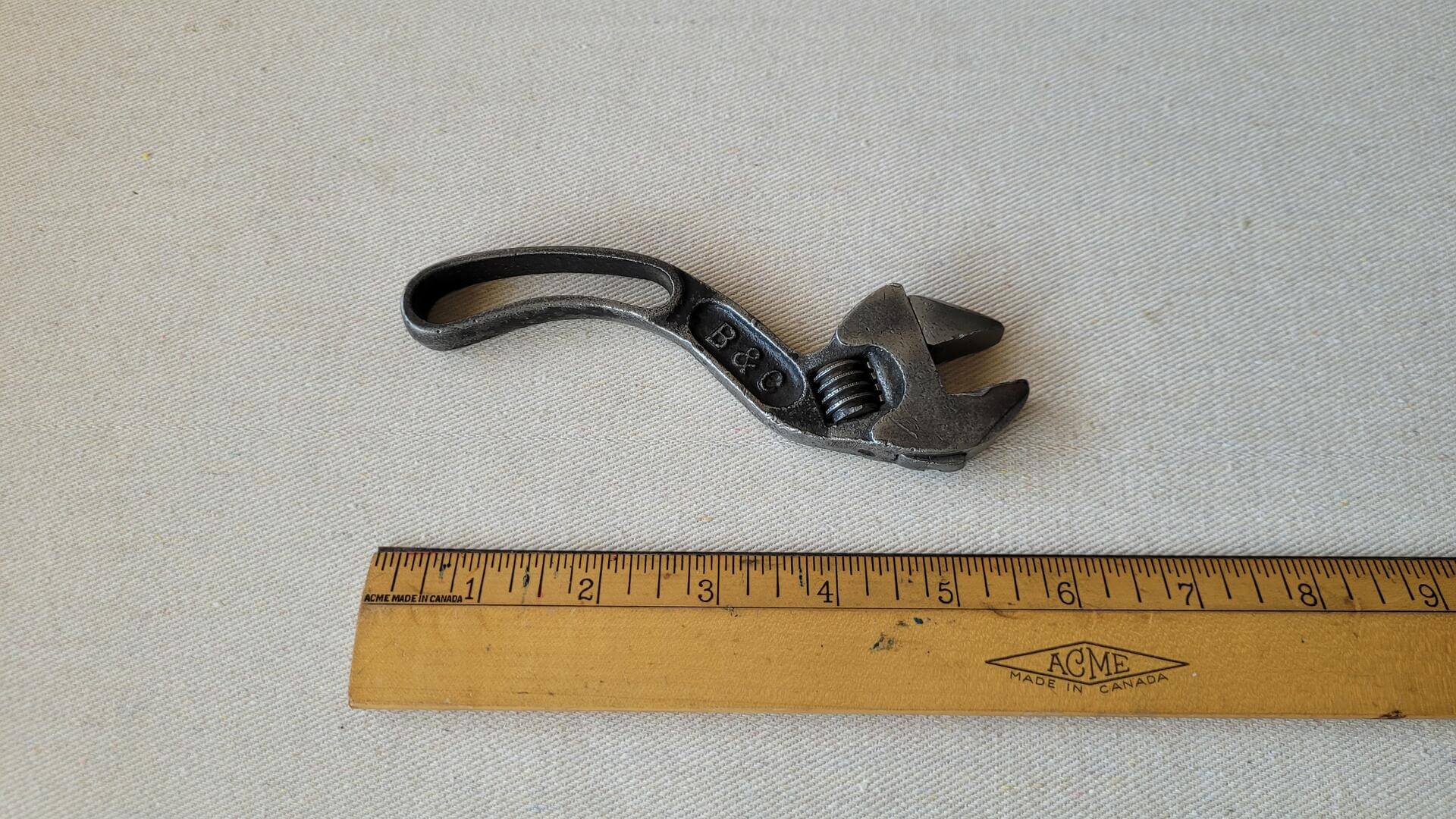Vintage Bemis & Call Company adjustable S curved wrench 6 inches long. Vintage made in USA collectible automotive and machinist hand tools