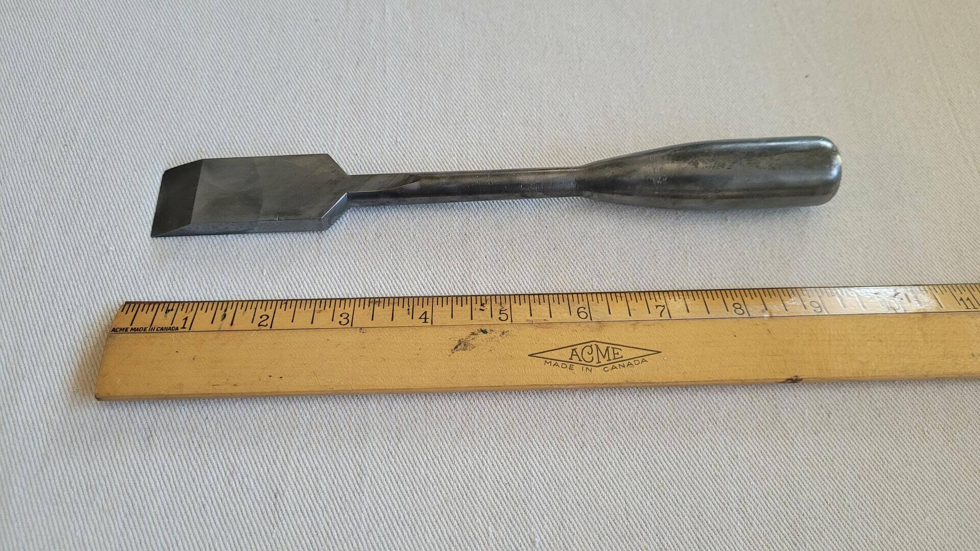 all steel vintage firmer chisel 1-1/8 inch wide plain edge large mechanic or woodworking one piece custom made solid steel chisel with handle