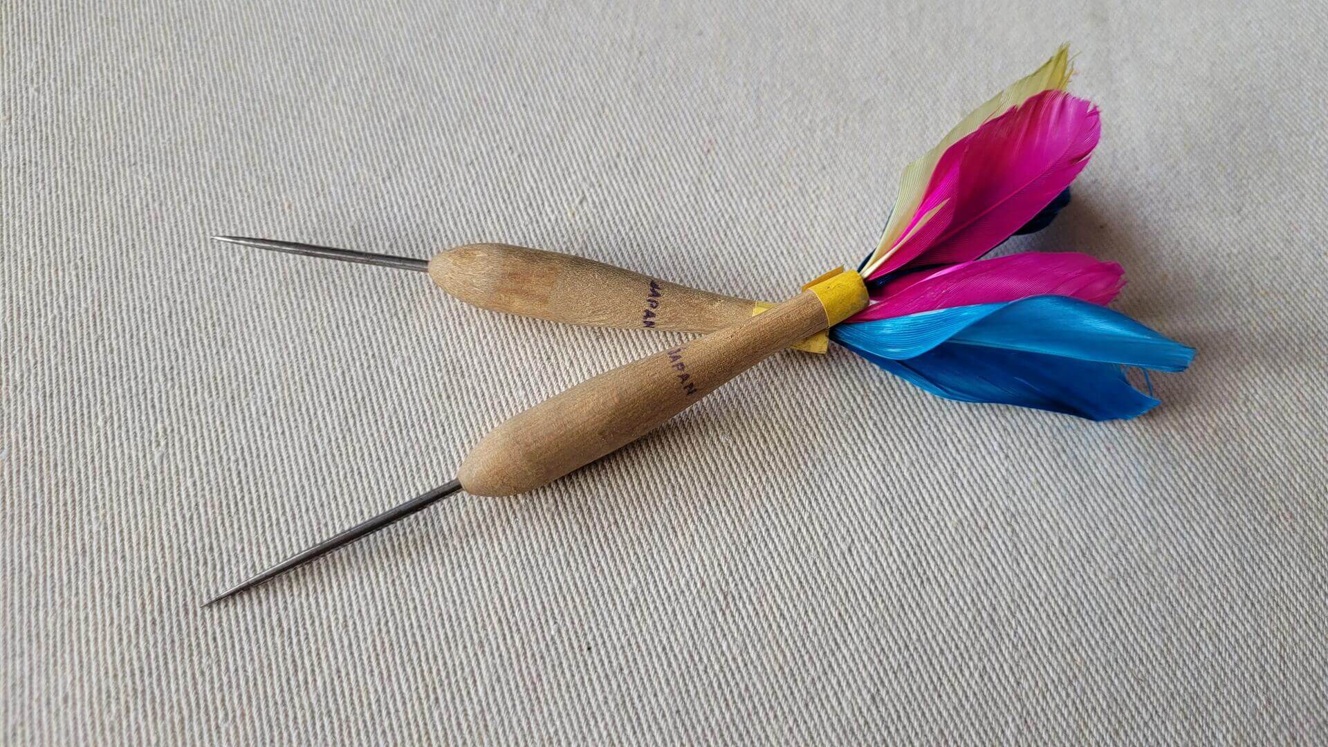 Rare set of 5 mid century wooden shafted natural feather darts with the steel tip. Vintage made in Japan collectible sporting goods & darts memorabilia