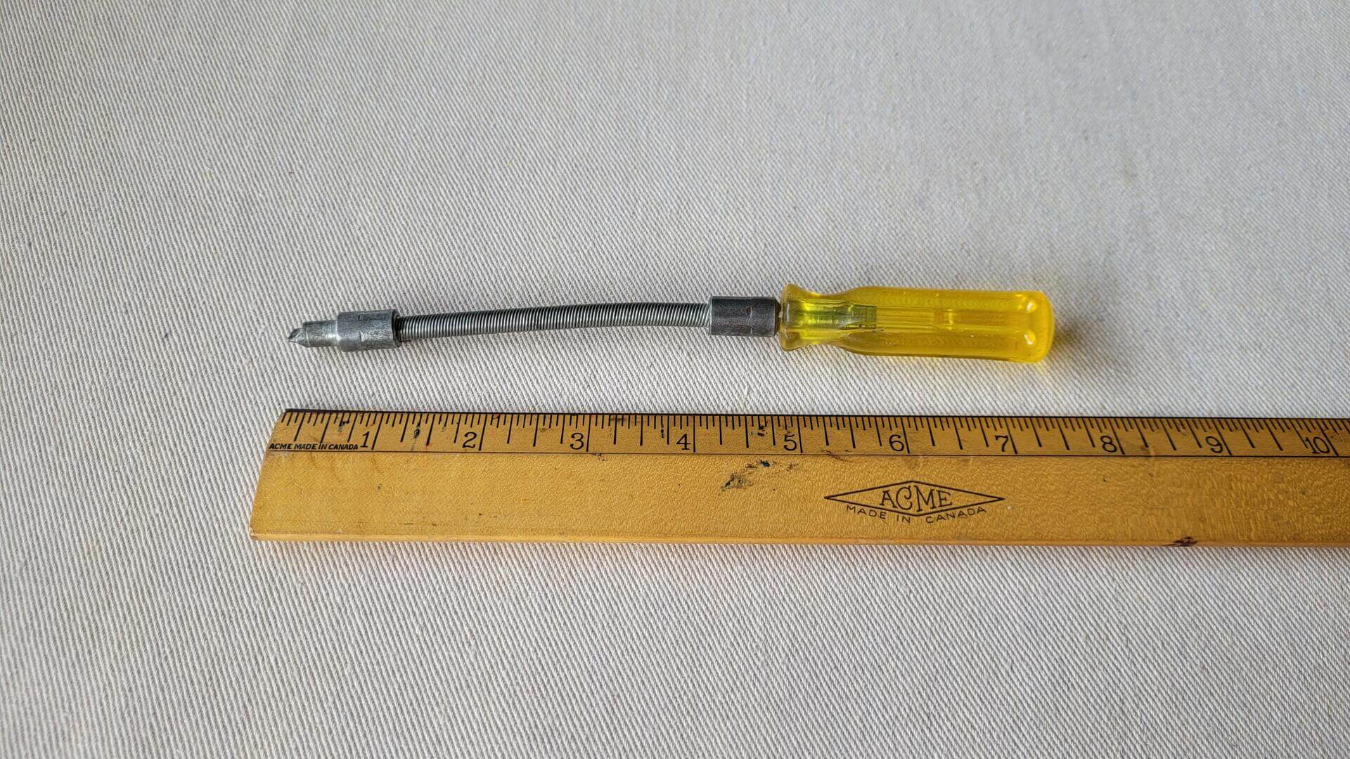 Nice retro flexible shaft slotted / flathead screwdriver 7 1/2 inches long. Vintage made in USA collectible mechanic and automotive hand tools