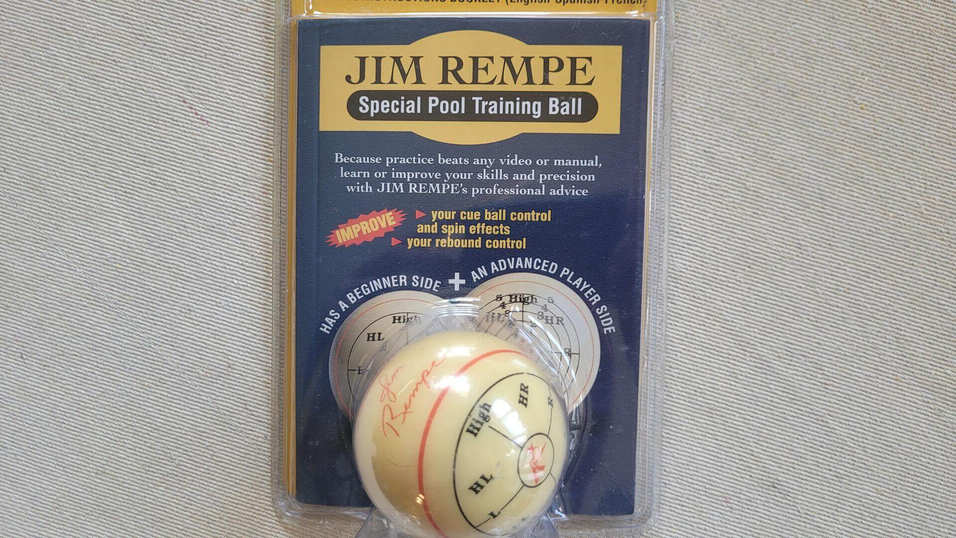 A Belgian Aramith cue ball with 2 different embedded patterns, one beginner and one advanced. See where to hit the cue ball for spin (English). Utilizing expert training methods, the Jim Rempe Training Cue Ball helps players