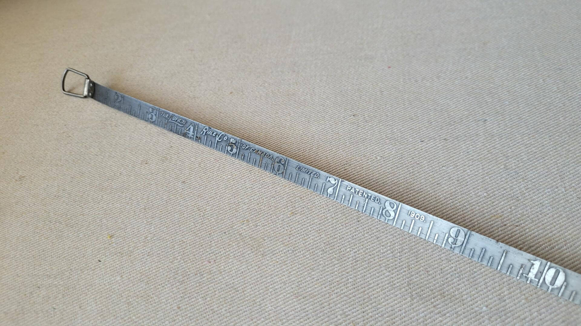 Rare vintage Lufking Rule Co of Canada No. 560 steel tape measure 25 ft pat 1909. Antique made in Canada collectible marking & measuring hand tool