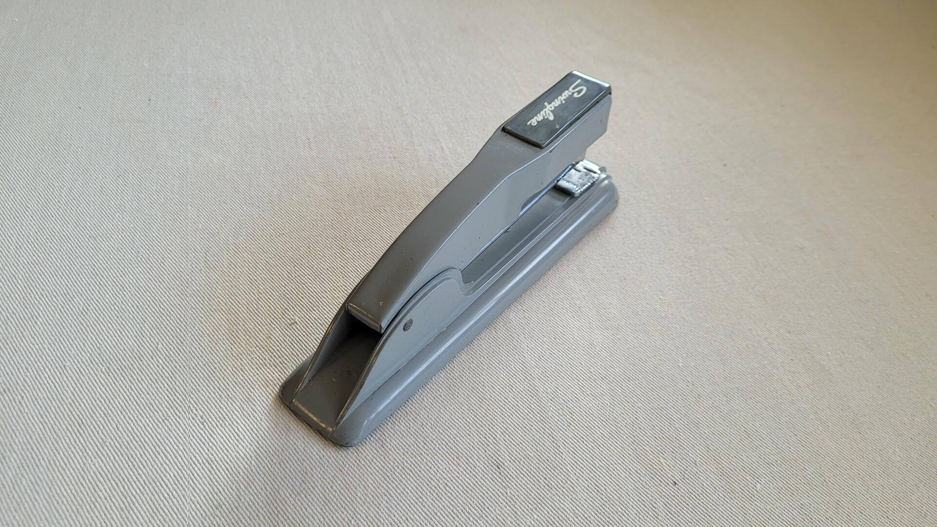 Retro 1950s swingline No. 27 steel Art Deco style stapler in battleship gray colour. Vintage made in USA MCM collectible office equipment & desk accessories