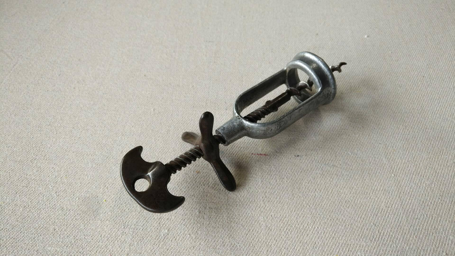 Beautiful antique Napoleon hat French triple fixed wingnut style open frame corkscrew bottle opener. Rare vintage barware & breweriana collectible
