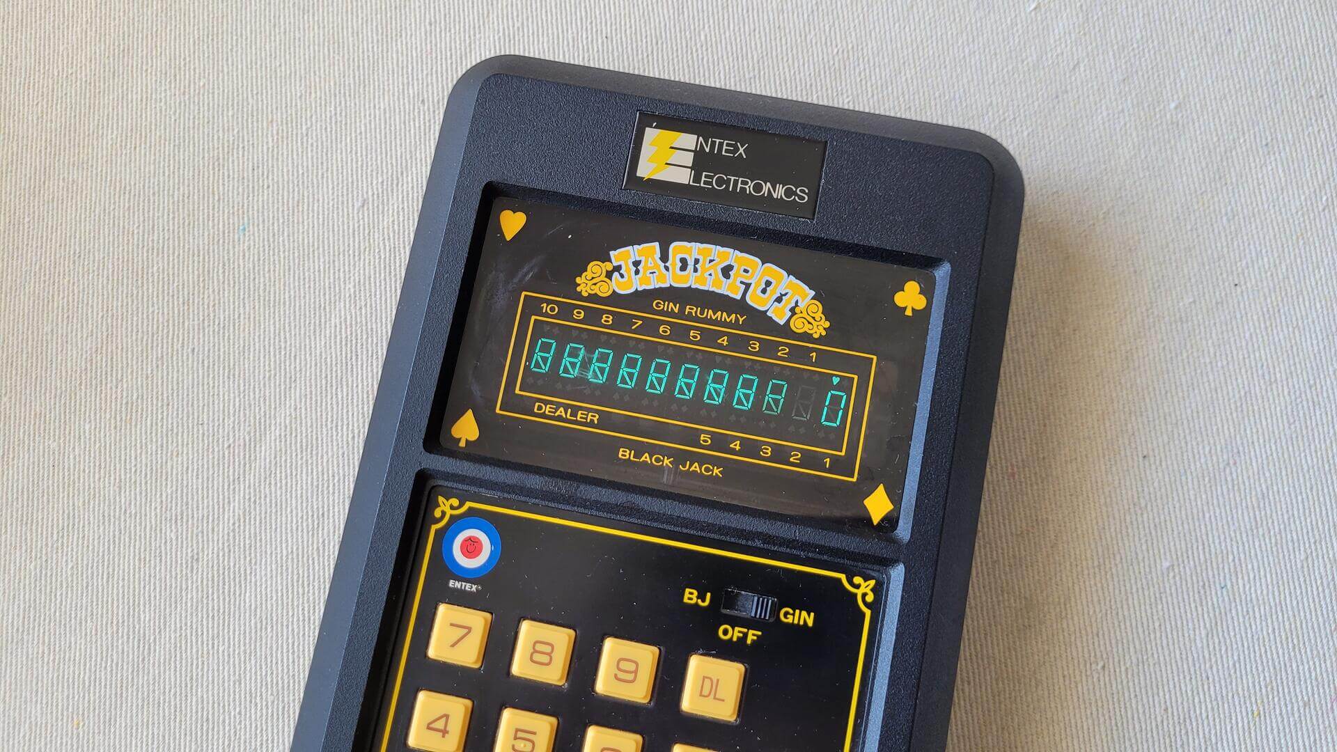1980s vintage Jackpot Gin Rummy & Black Jack handheld game by Entex Electronics. Retro made in Japan collectible electronic toys and gadgets.