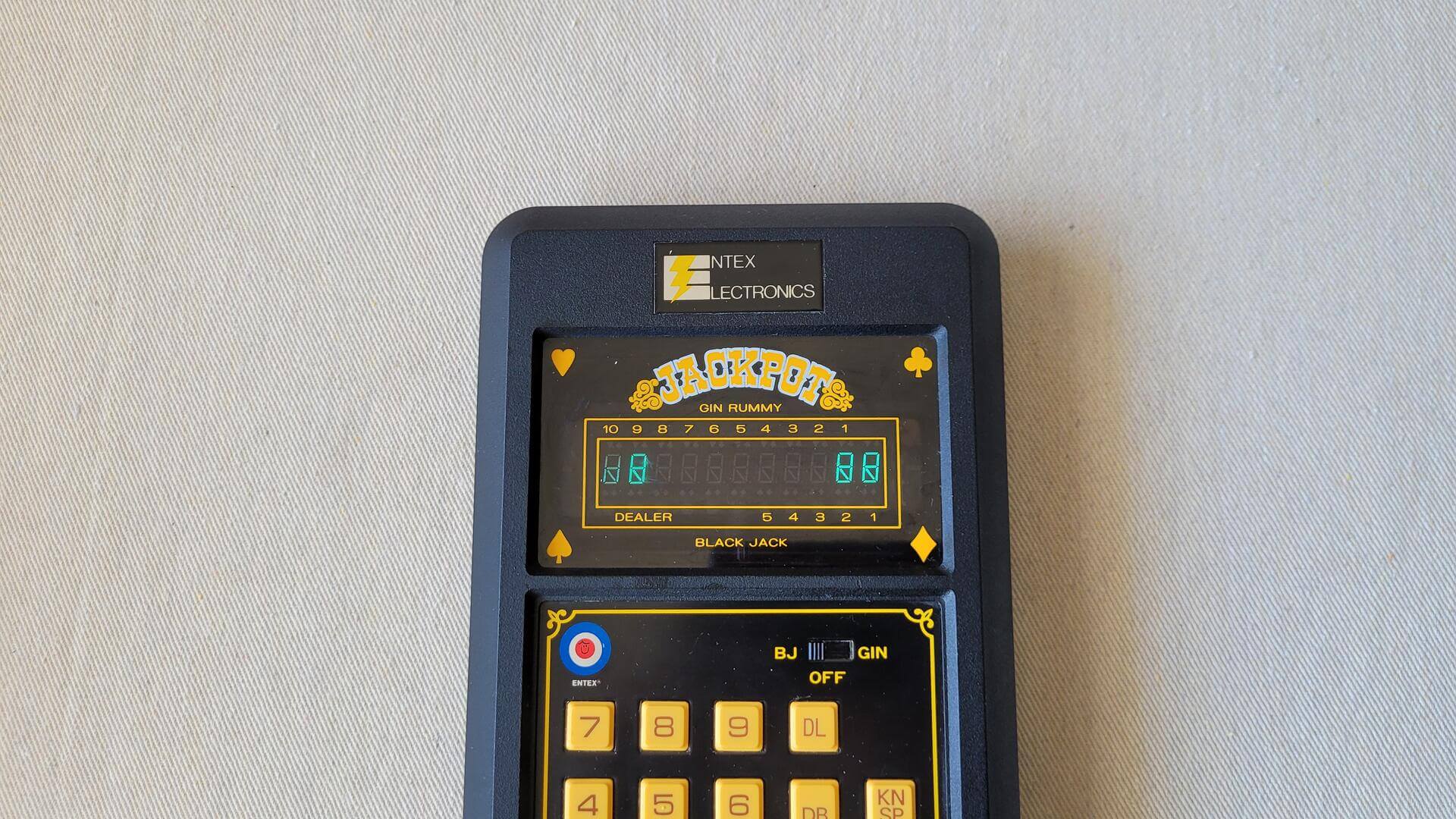 1980s vintage Jackpot Gin Rummy & Black Jack handheld game by Entex Electronics. Retro made in Japan collectible electronic toys and gadgets.