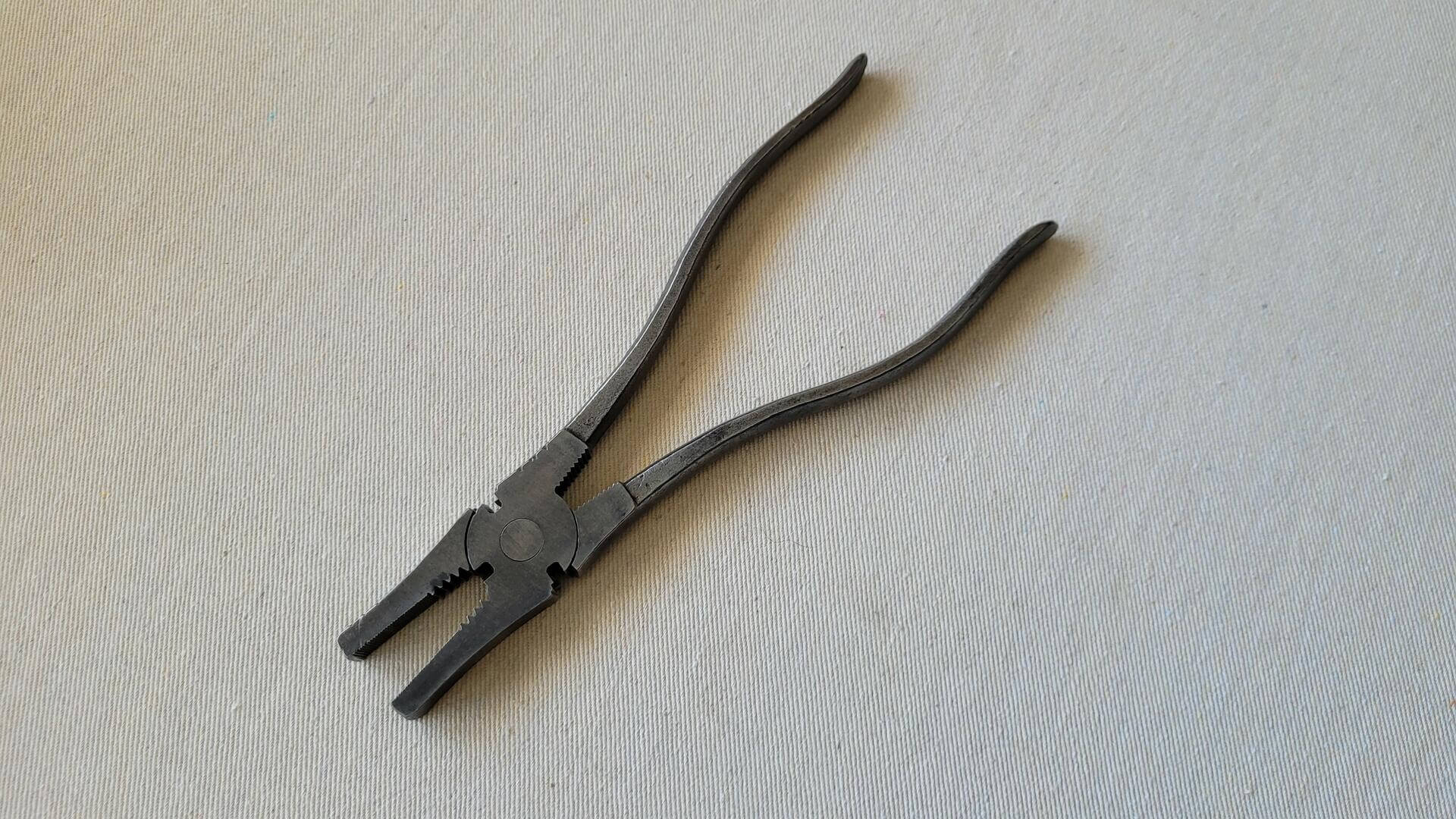 Vintage fence wire cutters and pliers 9 1/2 inches with the bottom set of gripping teeth. Vintage made in USA collectible fencing farm and lineman gripping hand tools