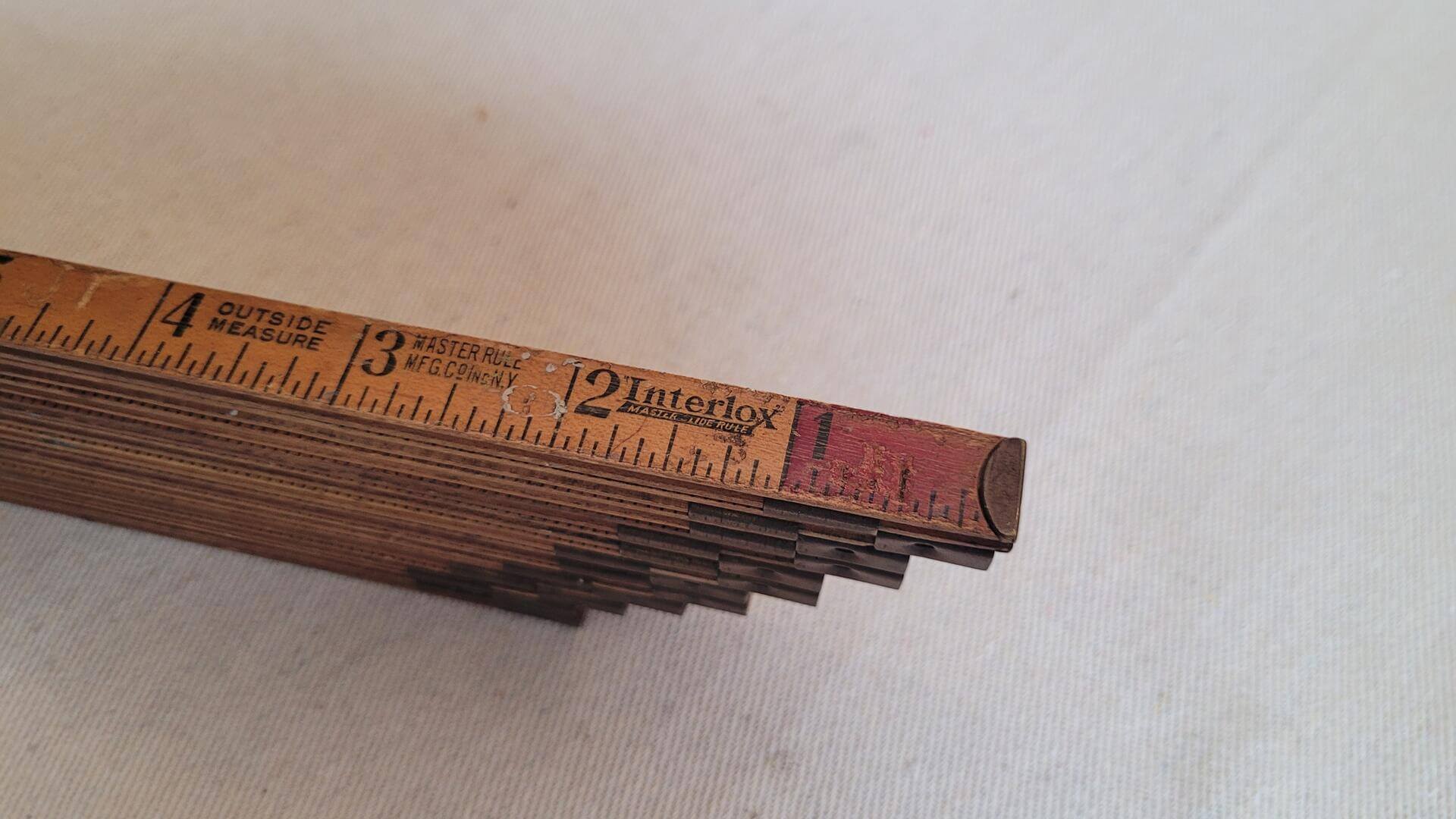 Antique woodworking Interlox No. 106 wooden slide rule by Master Rule Mfg Co from NY. Vintage made in USA collectible marking and measuring carpentry tools
