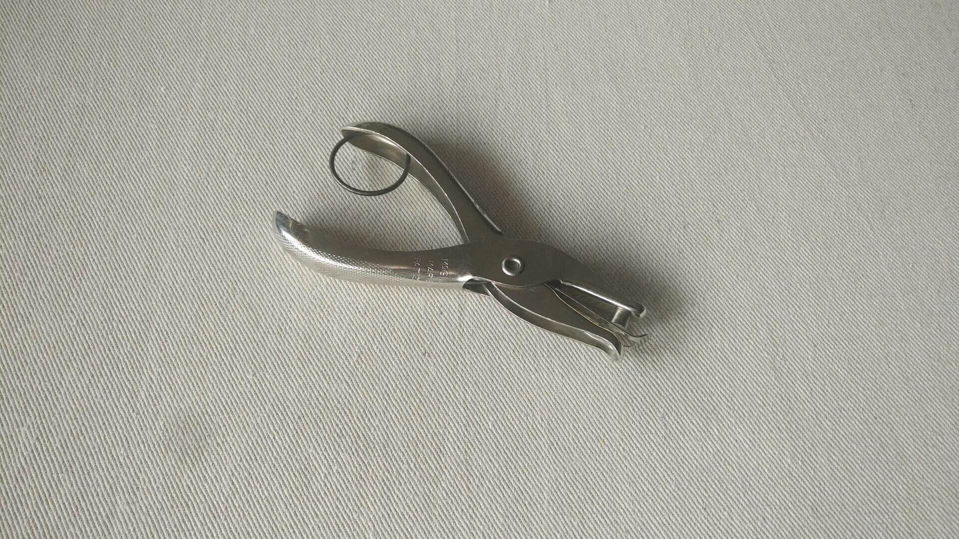 Vintage Gem handheld ticket & single hole paper punch by McGill Metal Products Co Marengo, IL. Antique made in USA office tools and stationery collectible.