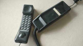Nice Solo model black retro touch dial phone by Northern Telecom in mid 1990s. Vintage made in Canada collectible telephone and communication equipment