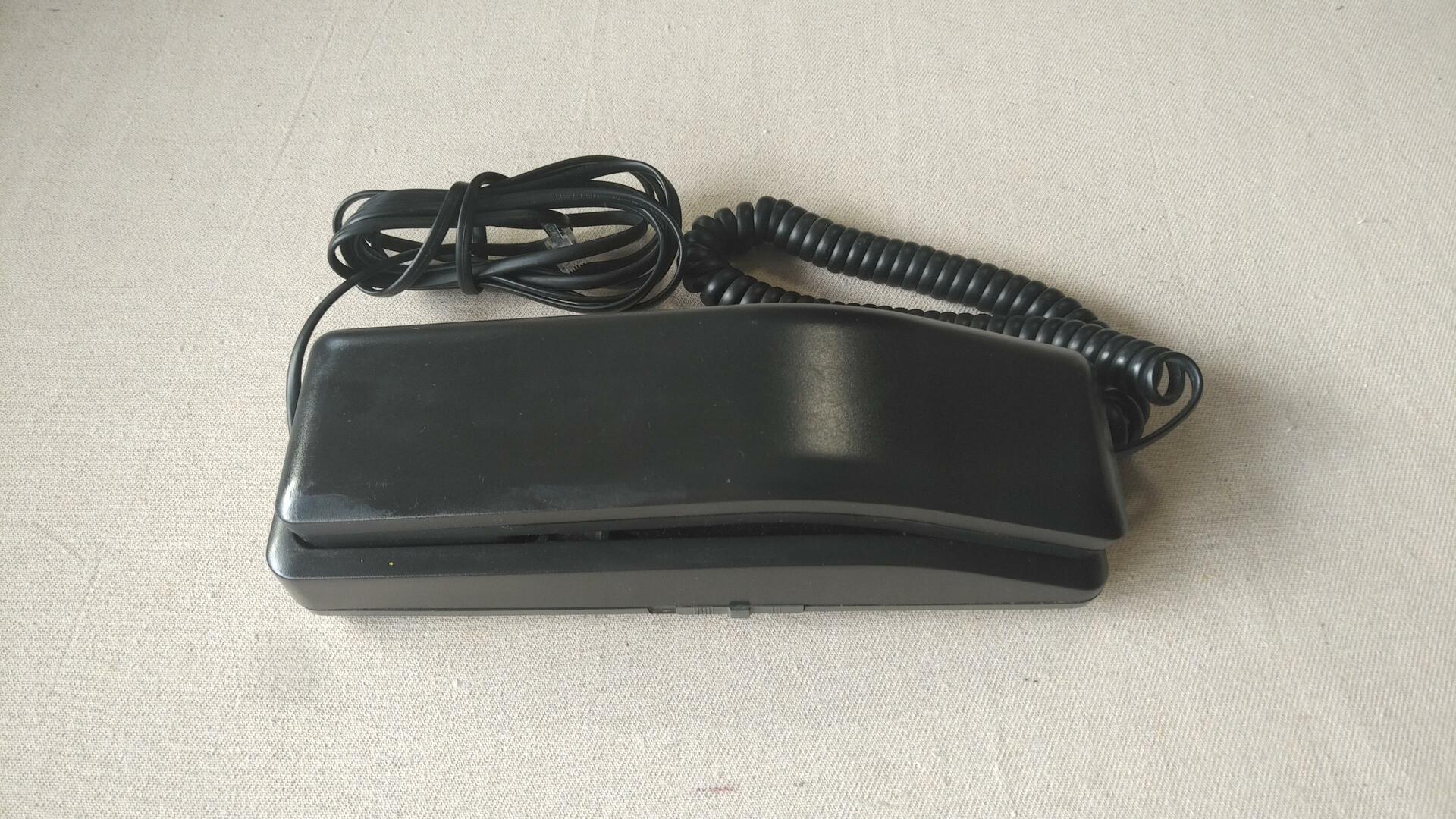 Nice Solo model black retro touch dial phone by Northern Telecom in mid 1990s. Vintage made in Canada collectible telephone and communication equipment