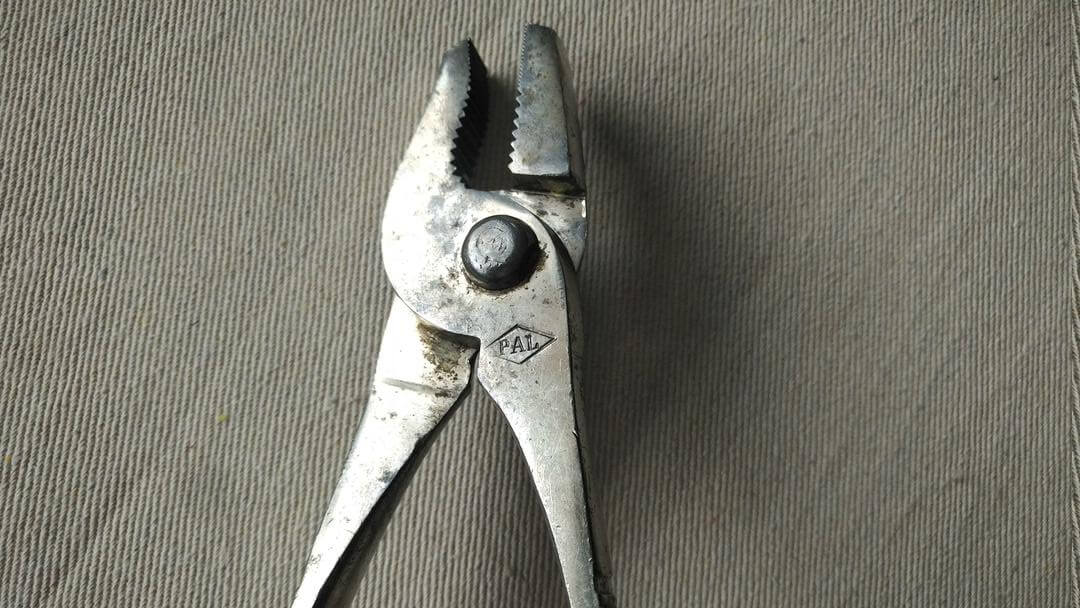 Nice pair of PAL drop forged adjustable slip joint pliers with knurled handles 7.5 inches long. Vintage made in Germany collectible gripping hand tools