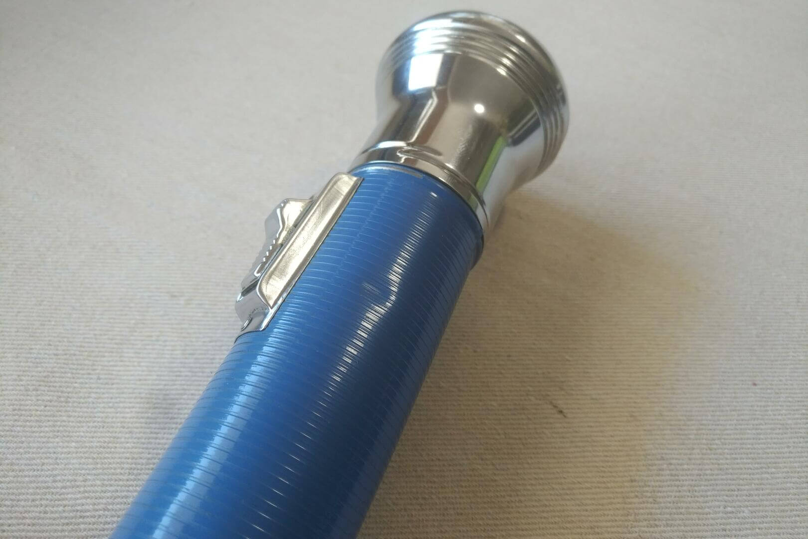 Vintage Panasonic emergency flashlight in chrome and blue. 1970s retro made in Japan collectible lightning and household tools