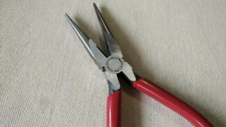 Quality Stanley Challenger vintage long needle nose pliers w cutters and red handle grips. Vintage made in USA collectible electrician & jeweler hand tools